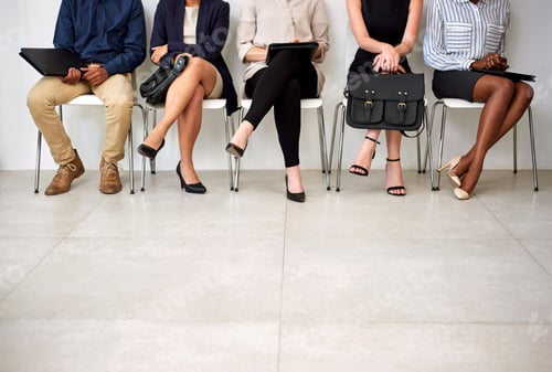 Preview: Shot of a group of businesspeople seated in line while waiting to be interviewed