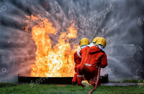 Preview: fire fighter team on training with gas and oil fire hold hose spray jet water spray to extinguish