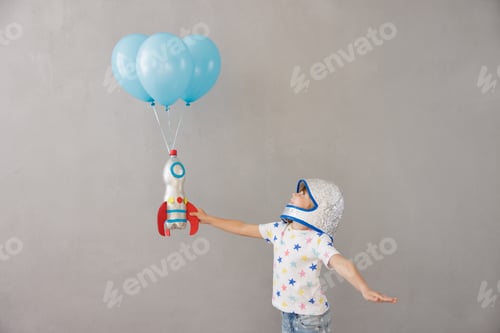 Preview: Child With Rocket And Balloons Pretends To Fly