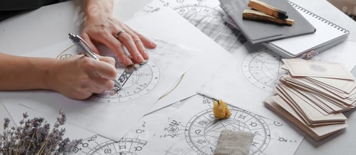 Preview: Astrology. Astrologer calculates natal chart and makes a forecast of fate Tarot cards