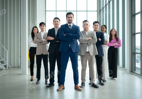 Preview: Group of business people standing in line in conference room used for meeting in modern office