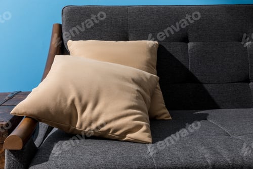 Preview: close-up shot of pillows lying on comfy couch