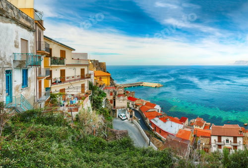 Preview: Beautiful seaside town village Scilla with old medieval castle on rock Castello Ruffo