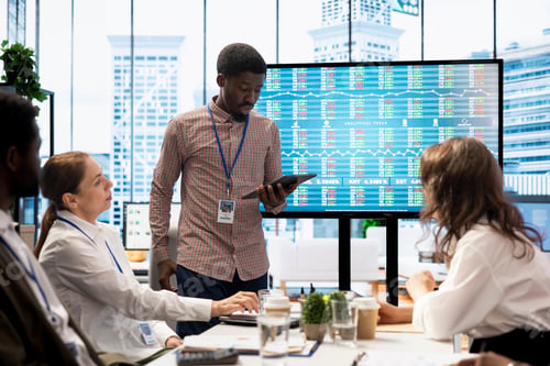 Preview: Team of company analysts reviews feedback on sales and orders