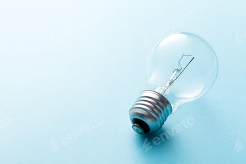 Preview: Macro Shot of a Light Bulb on Blue