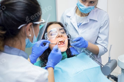 Preview: Two dental doctors and patient