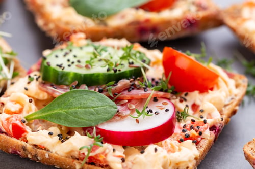 Preview: Sandwiches with cream cheese, vegetables and salami.