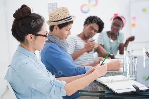 Preview: Young creative team having a meeting in creative office