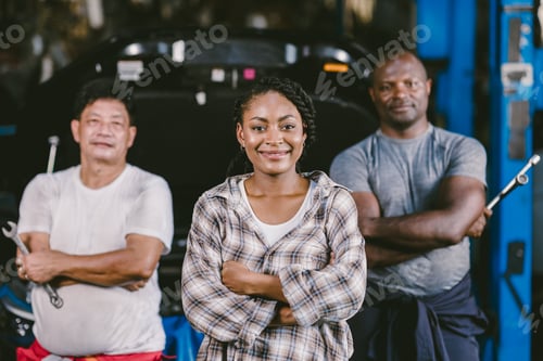Preview: auto service garage people mechanic with woman car owner customer standing happy smile