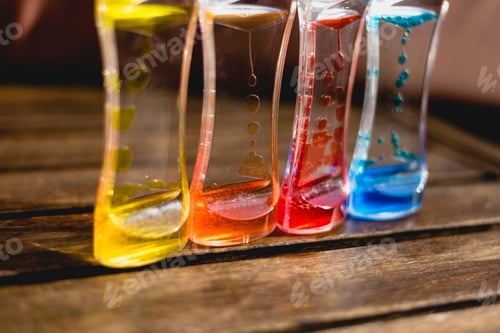 Preview: Toy with water and drops of oil colors.
