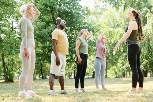 Preview: Senior people training outdoors with coach