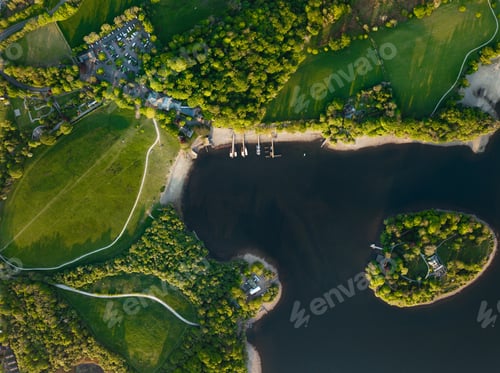 Preview: Aerial view directly above of Derwent Isle and Jetty on Derwent Water lake in the Lake District