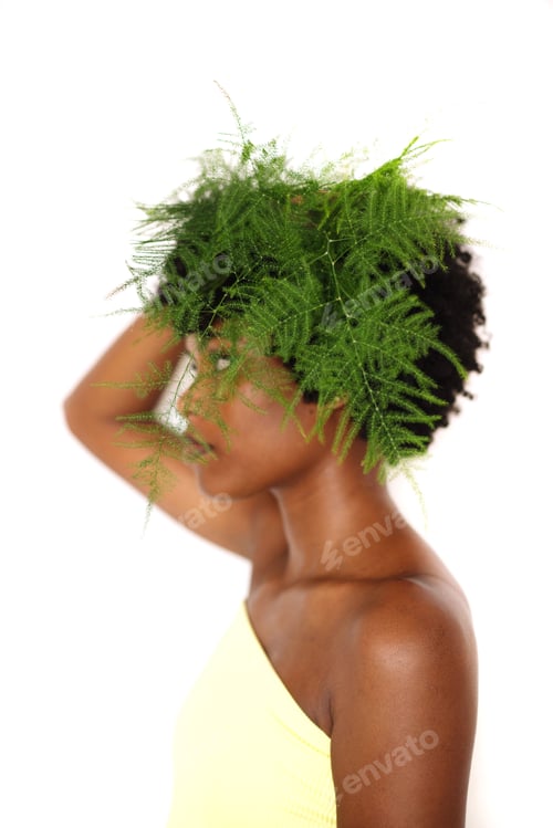 Preview: Black woman with green plant in her hair