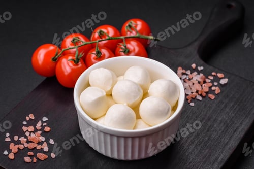Preview: Delicious fresh mozzarella cheese in the form of small balls with salt and spices