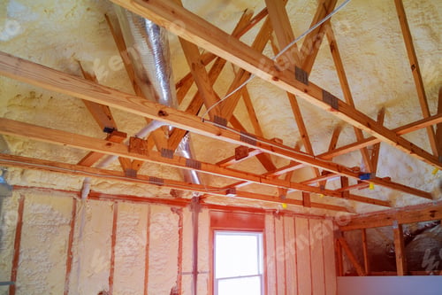 Preview: New home construction with selective focus of installation of heating system on the roof of the pipe