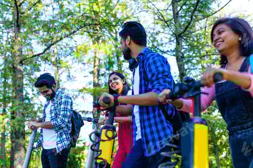 Preview: modern indian friends ride on segway in park in India