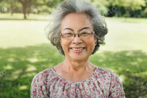 Preview: Smiling Senior Woman Enjoying the Outdoors