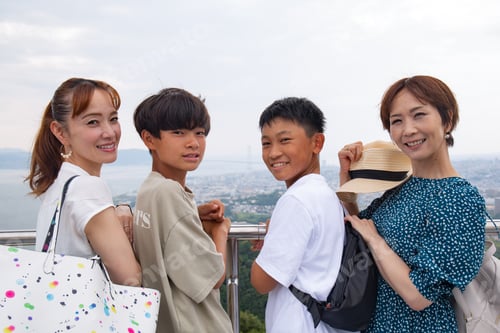 Preview: Two Japanese women and their teenage sons on a day out
