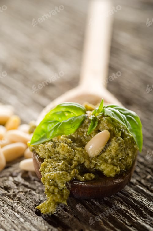 Preview: pesto sauce with ingredients on wood background