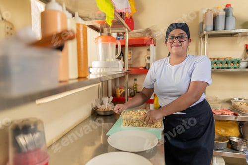 Preview: Portrait of a female young cook on duty