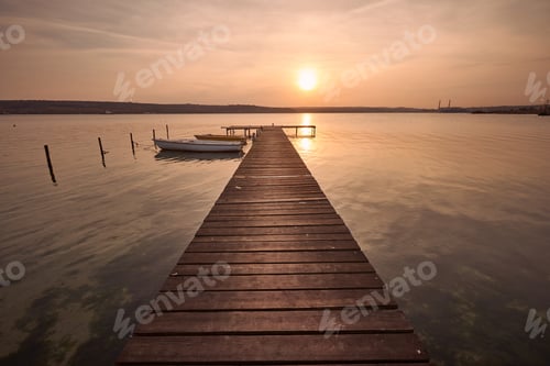 Preview: Landscape photo of a jetty and boats on lake at sunset in Varna, Bulgaria.