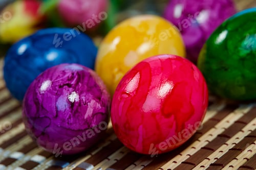 Preview: Selective focus shot of painted eggs on a table