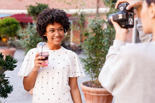 Preview: Photographer taking product photos for a client, working with a model
