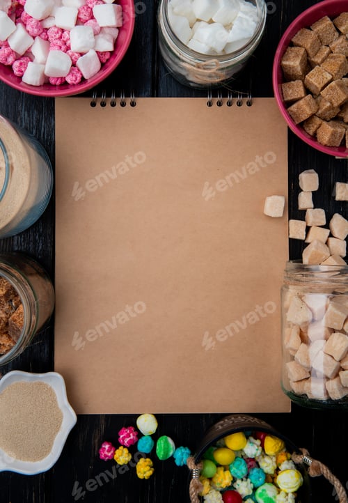 Preview: top view of a sketchbook with various types of sugar and candies in bowls and glass jars