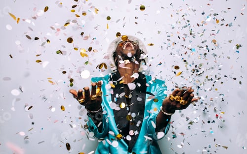 Preview: portrait of an hip hop music performer with confetti drop