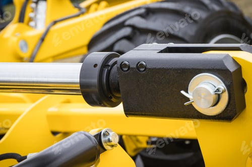 Preview: Piston or actuator and black tyre as part of pneumatic or hydraulic machine. Technology