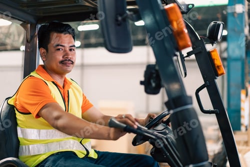 Preview: Asian male driver driving forklift to shipping delivery in the warehouse distribution