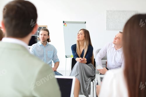 Preview: Young people having business training in office