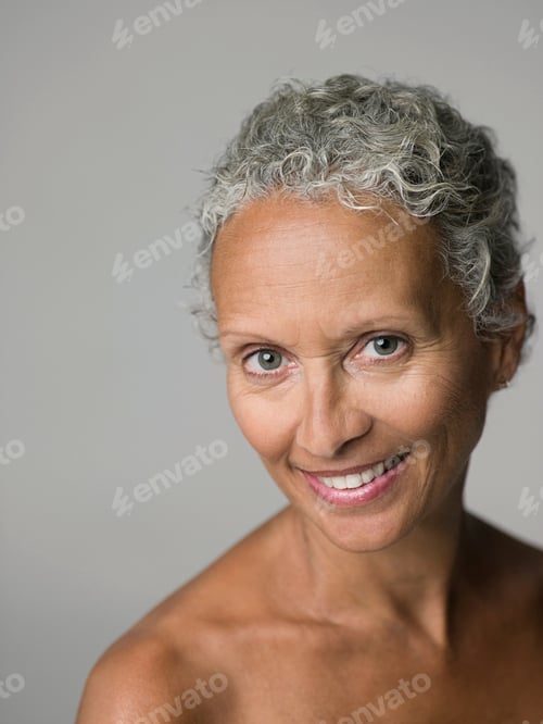 Preview: Elegant senior woman with a warm smile
