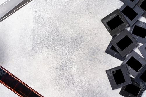 Preview: Photography empty slide frames on gray background
