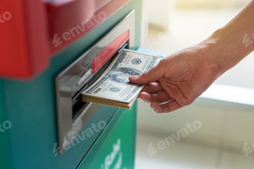 Preview: Closeup woman withdrawing the cash via ATM, business Automatic Teller Machine concept
