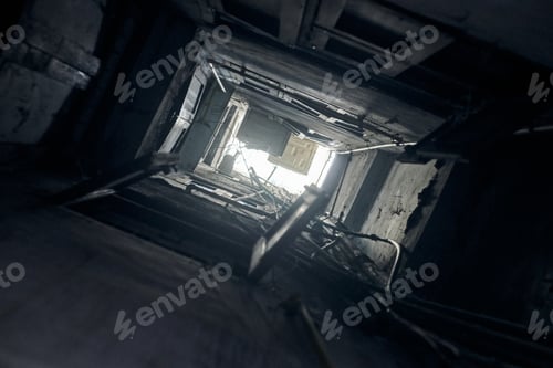 Preview: Indian yard well bottom up view to light on roof, narrow shaft yard with windows opposite each other