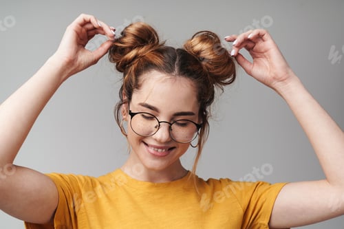 Preview: Close up of a cute young teenage girl wearing glasses