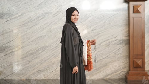 Preview: Muslim woman after worship at the mosque
