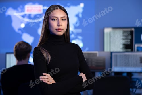 Preview: Serious Female Cybersecurity Analyst or Manager in large Cyber Security Operations Center SOC
