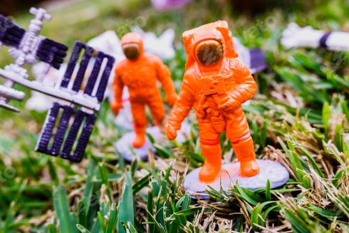 Preview: Detail of some plastic astronaut dolls.