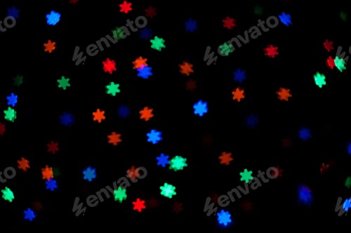 Preview: Abstract stars bokeh defocused lights on dark background