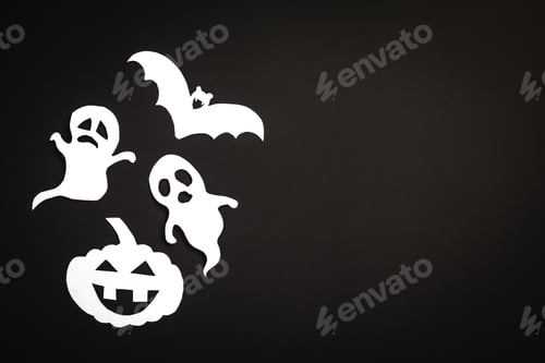 Preview: Halloween holiday background with pumpkin, ghosts and bat cut paper on black background.