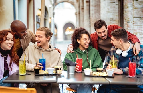 Preview: Multiracial trendy friends having fun moment at fancy cocktail bar