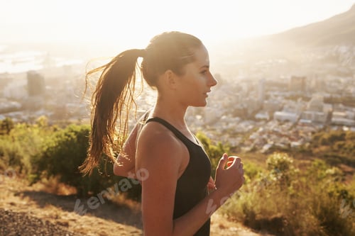 Preview: Running is a way of life. Shot of a young runner training outdoors.