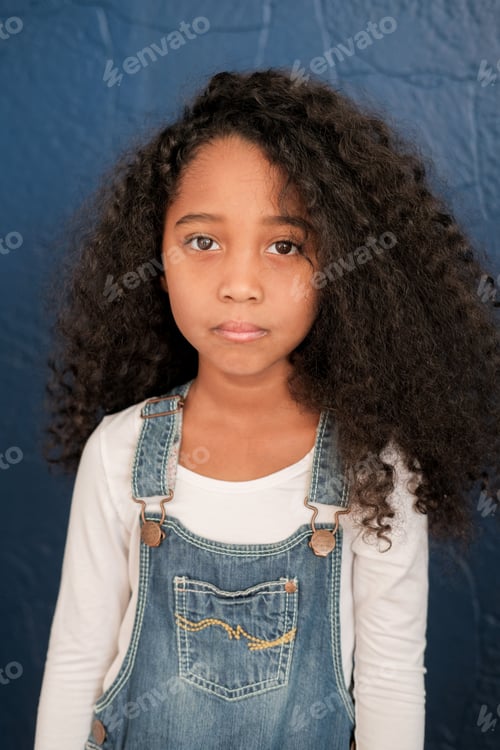 Preview: The African American Child Looks Directly Into The Camera In The Children'S Room.
