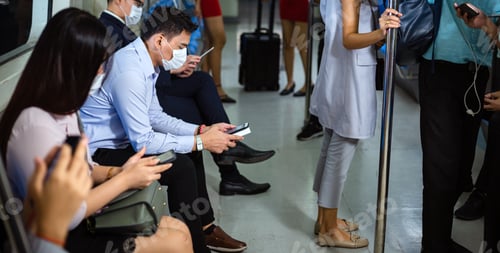 Preview: Asian passengers wearing mask travel by subway