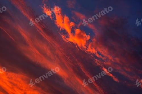 Preview: Stunning dramatic sunset sky with purple clouds and pink and red firmament texture banner