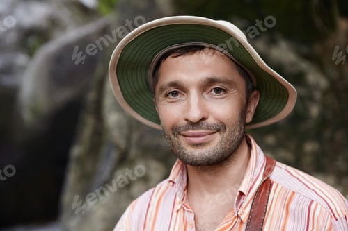 Preview: Nature protection concept. Headshot of handsome Caucasian male conservationist dressed in striped sh