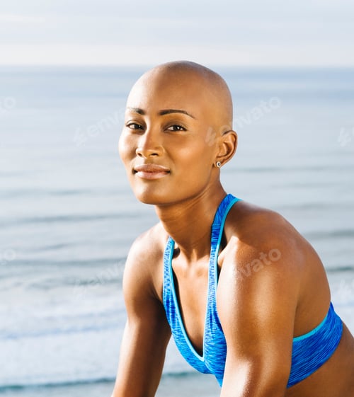 Preview: Portrait of young woman at beach