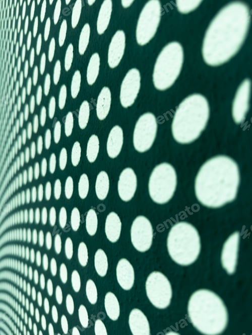 Preview: Perforated metal mesh with circles and geometric shadows projected onto a green wall